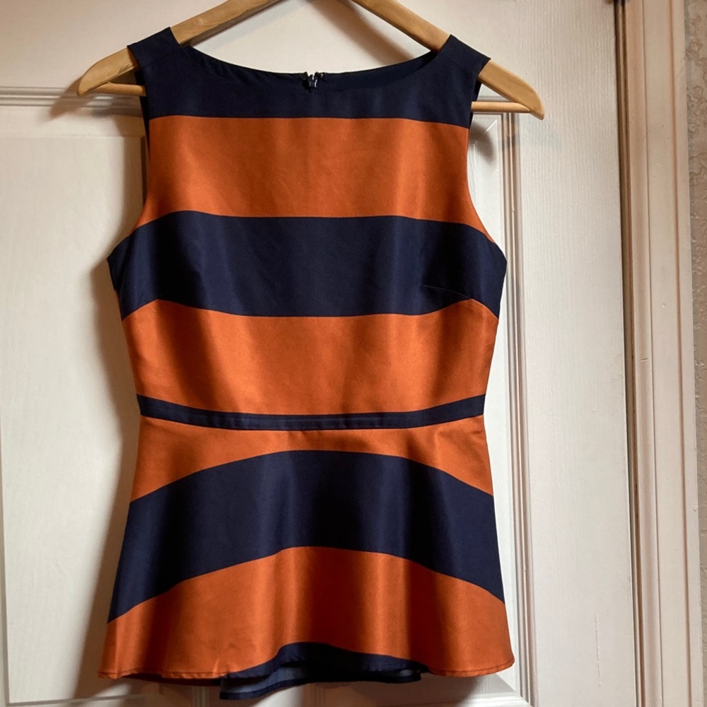 Rugby stripes but make it polished: Banana Republic Navy/Orange Peplum Top